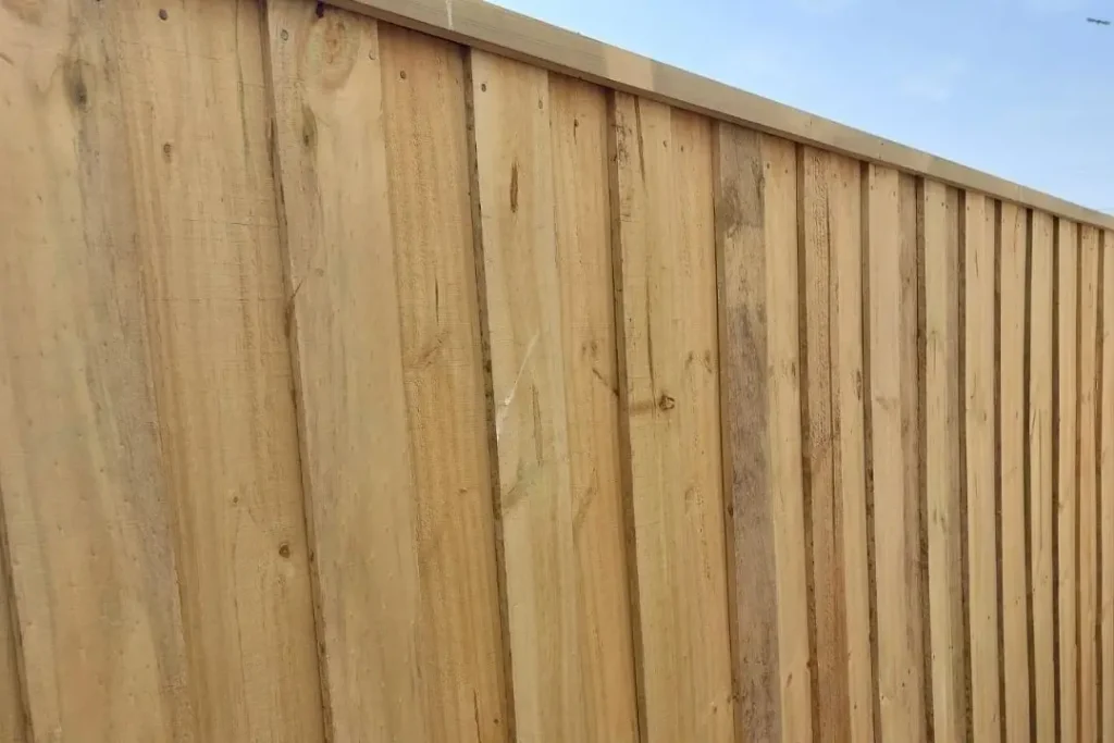lapped and capped fence