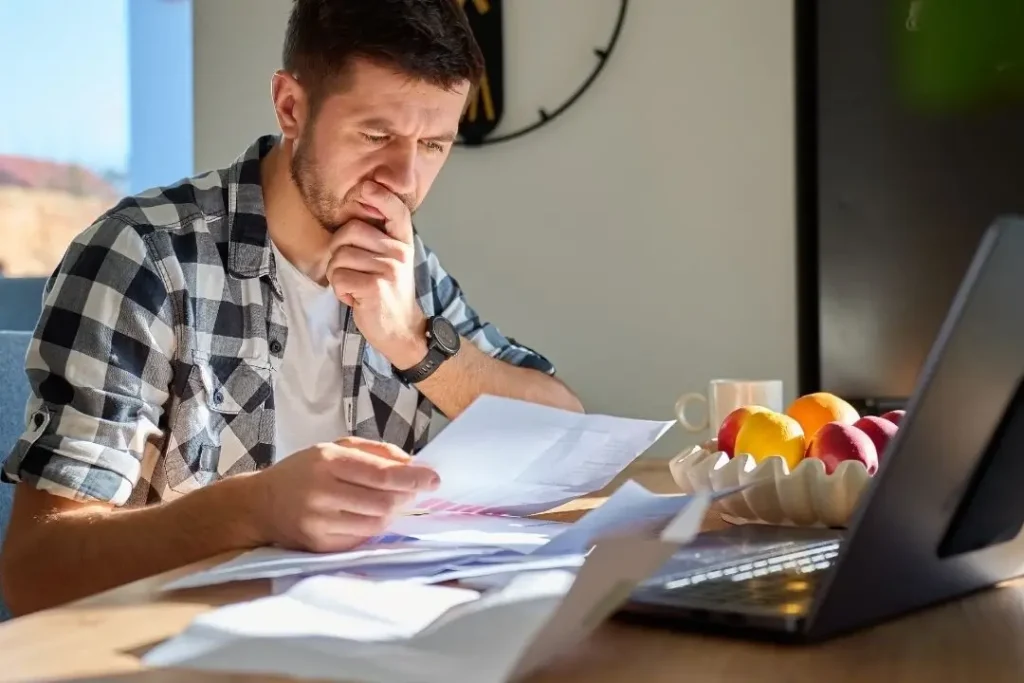 man reading documents
