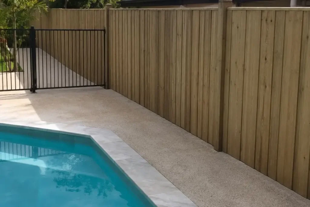 timber boundary fence and aluminium pool fence